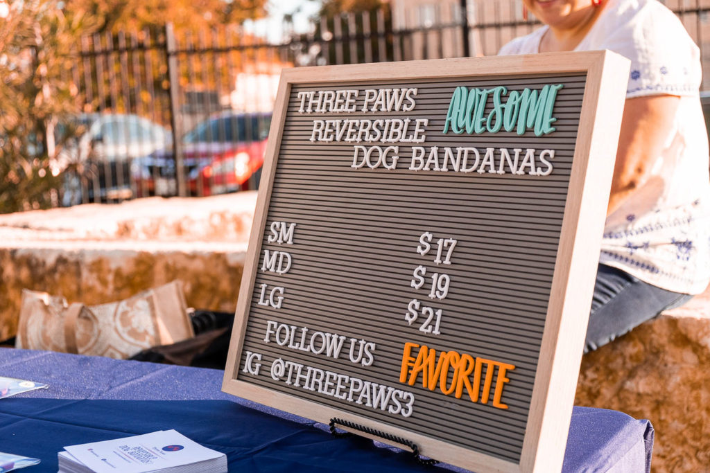 three paws bandanas sign at fall fur fest