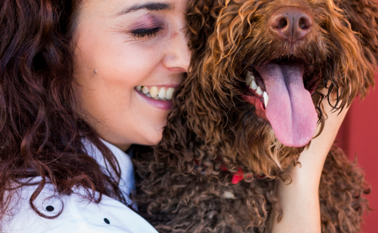 woman hugging dog with caption doggy date ideas in san antonio