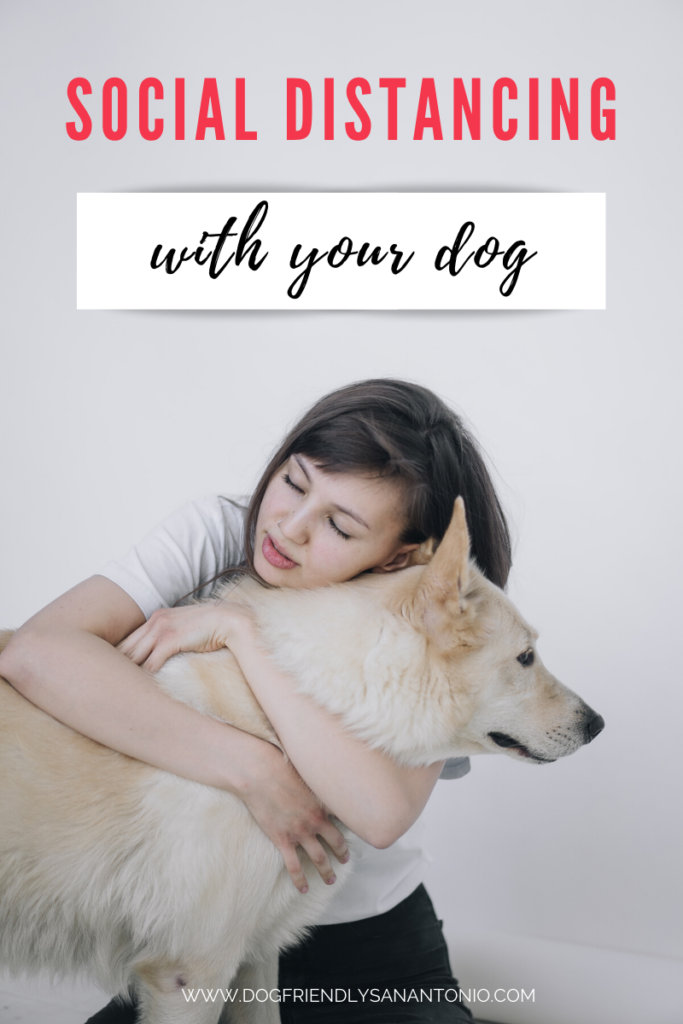 woman hugging dog, caption reads "social distancing with your dog"