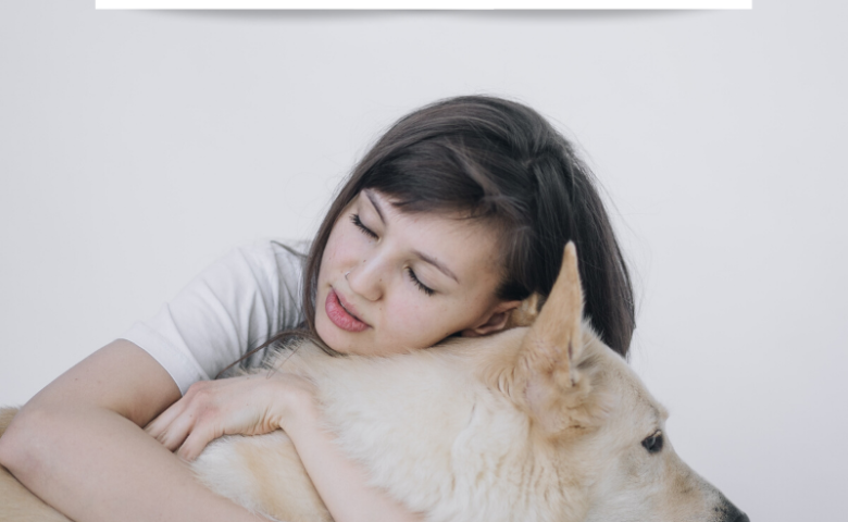 woman hugging dog, caption reads "social distancing with your dog"